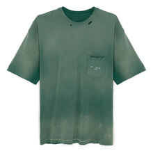  Detail of cotton single stitch pocket tee dyed green then faded and washed for vintage look 