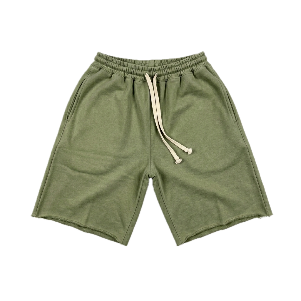 Olive green sweat shorts with an elastic waistband and a cream-colored drawstring, shown flat on a white background.