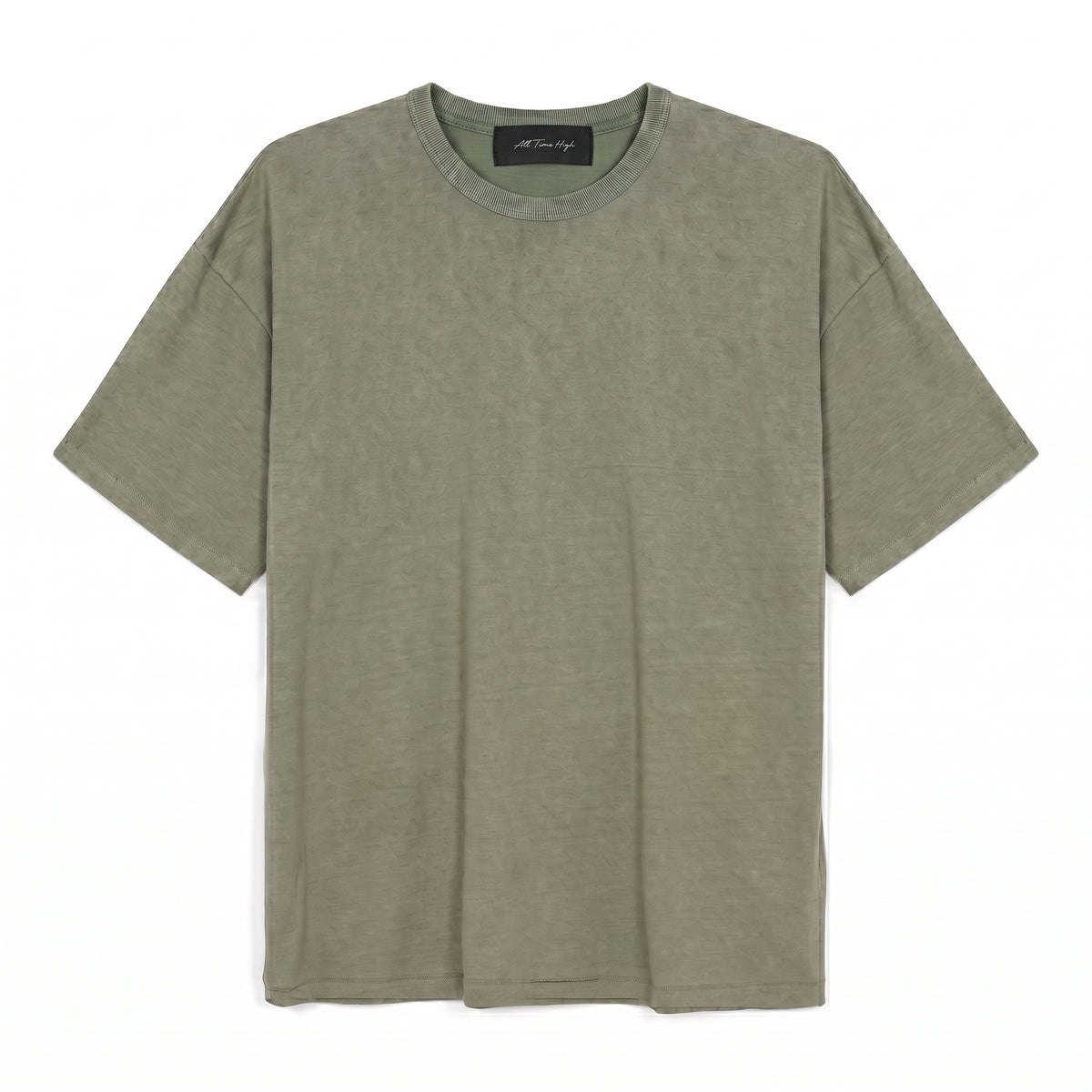 An oversized short-sleeve crewneck t-shirt in a washed, heathered olive green color, laid flat against a solid white background.